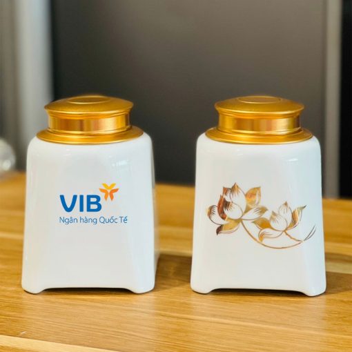 Hũ trà trắng vẽ vàng hoa sen in logo VIB cho doanh nghiệp ACLGQBV117